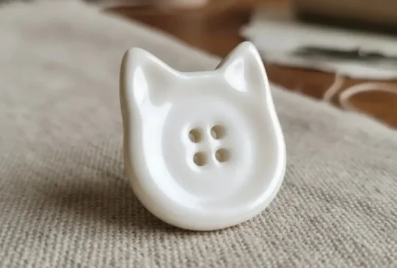 bouton oreille chat